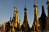 Inle Lake Myanmar. Indein, on the summit of a hill the  Shwe Inn Thein Paya a cluster of hundreds of ancient stupas. Many of them are ruined and overgrown with bushes. 